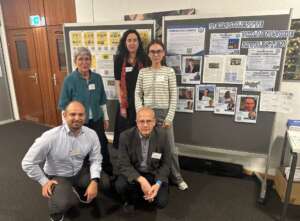 Dr. Andreas Umland, Liusiena Zinovkina, Dr. Annette Werberger, Valerio Krüger vor dem IGFM-Stand